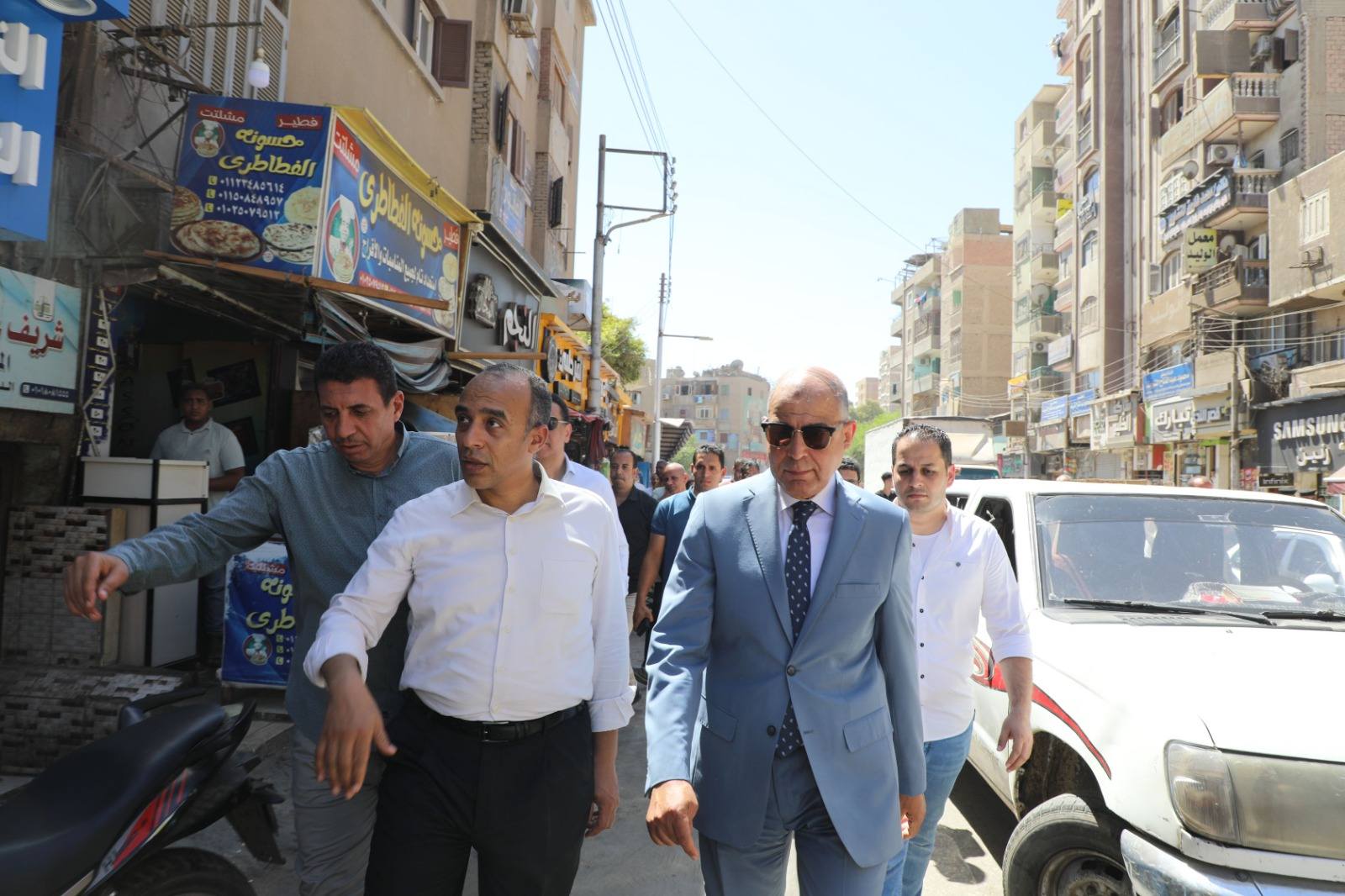 قد تكون صورة ‏‏‏‏٤‏ أشخاص‏، و‏شارع‏‏ و‏نص‏‏